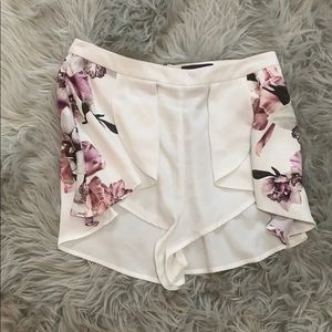 White flowy floral shorts